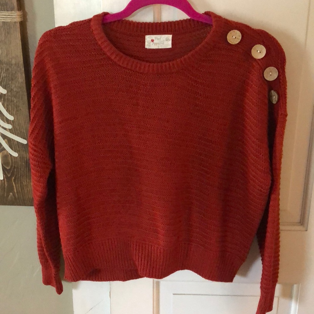 Rust colored sweater with button detail